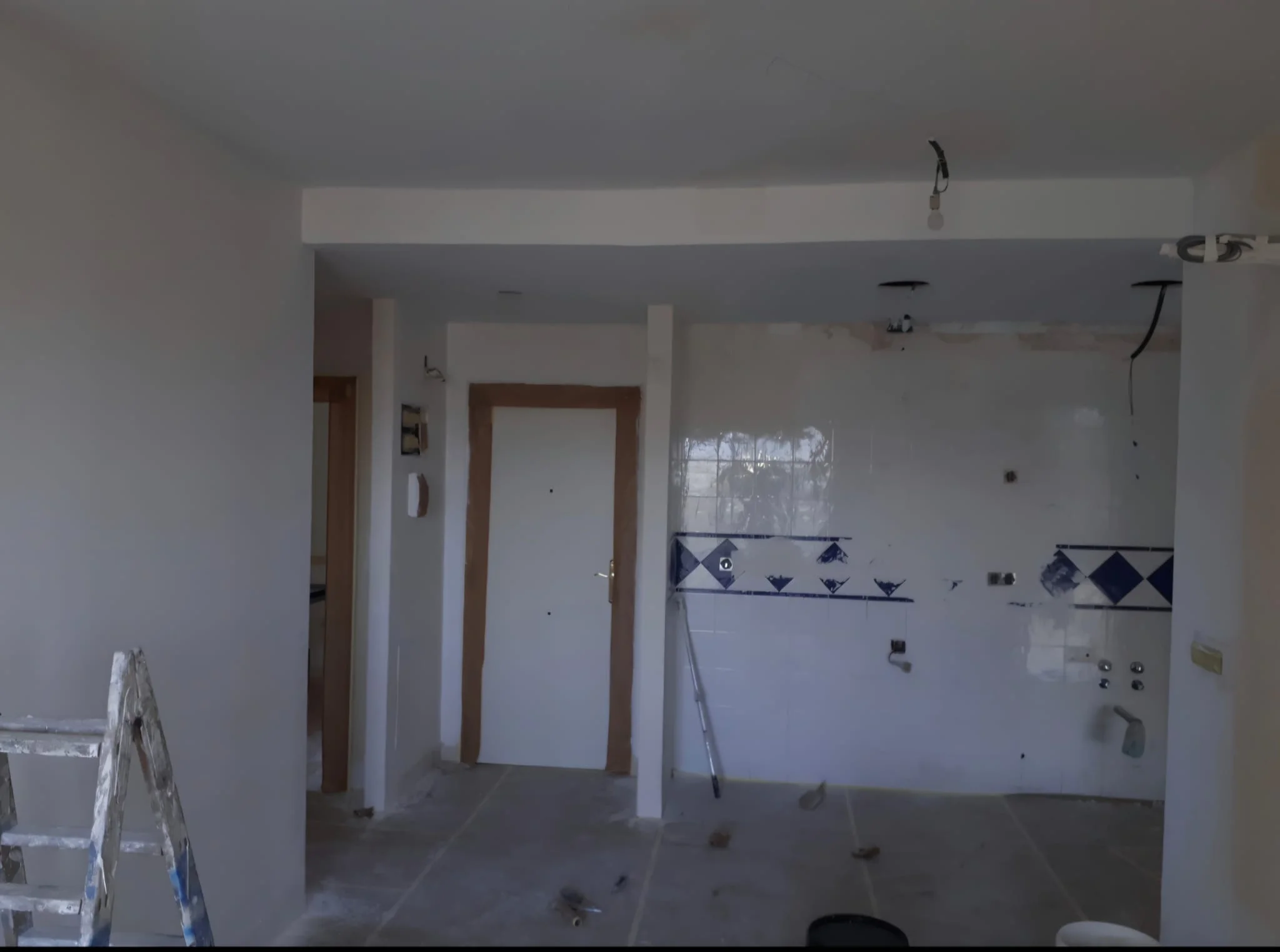 Before photo of a painting and repair project.