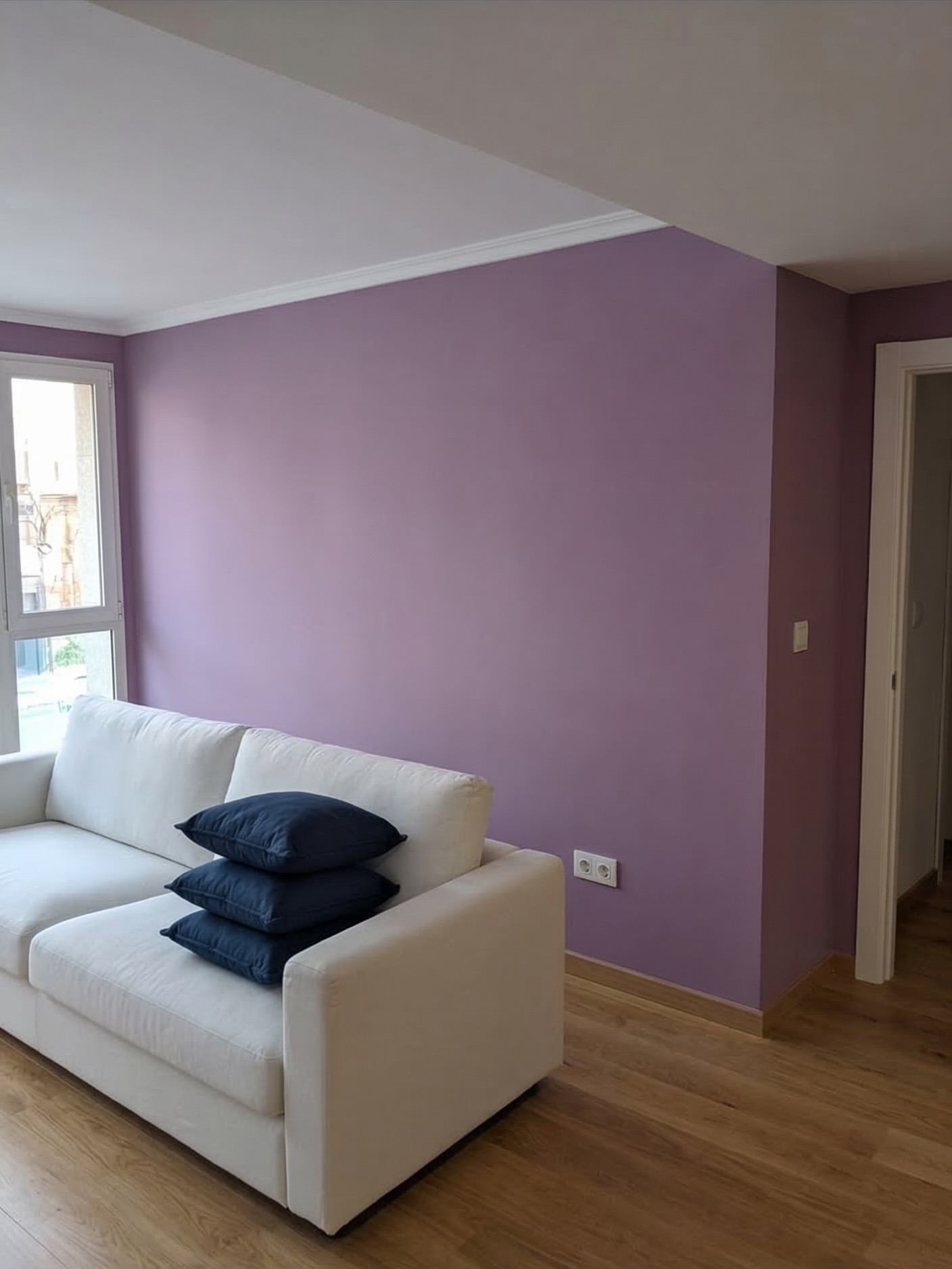 Detail of completed interior wall with the new accent color and neat edges.